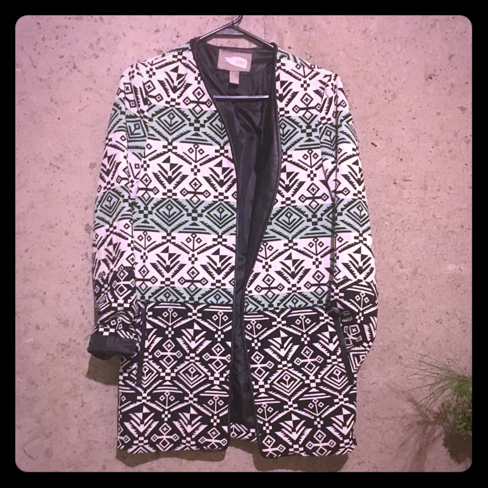 The coolest tribal midi blazer 💚💙🖤